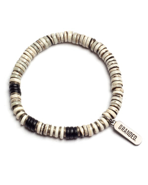 
                  
                    Load image into Gallery viewer, BRANDED. BONE BUTTON BRACELET. (GREY)
                  
                