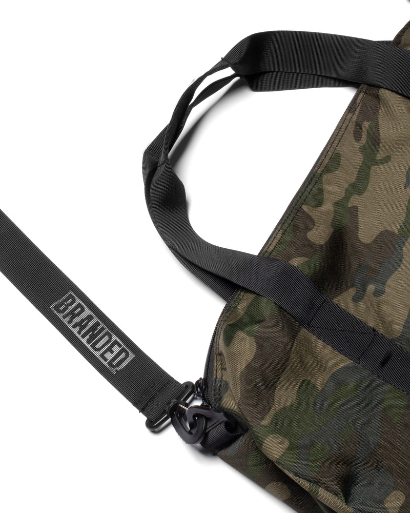 
                  
                    Load image into Gallery viewer, BLOGO CAMO DUFFEL BAG.
                  
                
