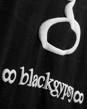
                  
                    Load image into Gallery viewer, BLACKGYPSY. T-SHIRT:  WHITE LOGO
                  
                
